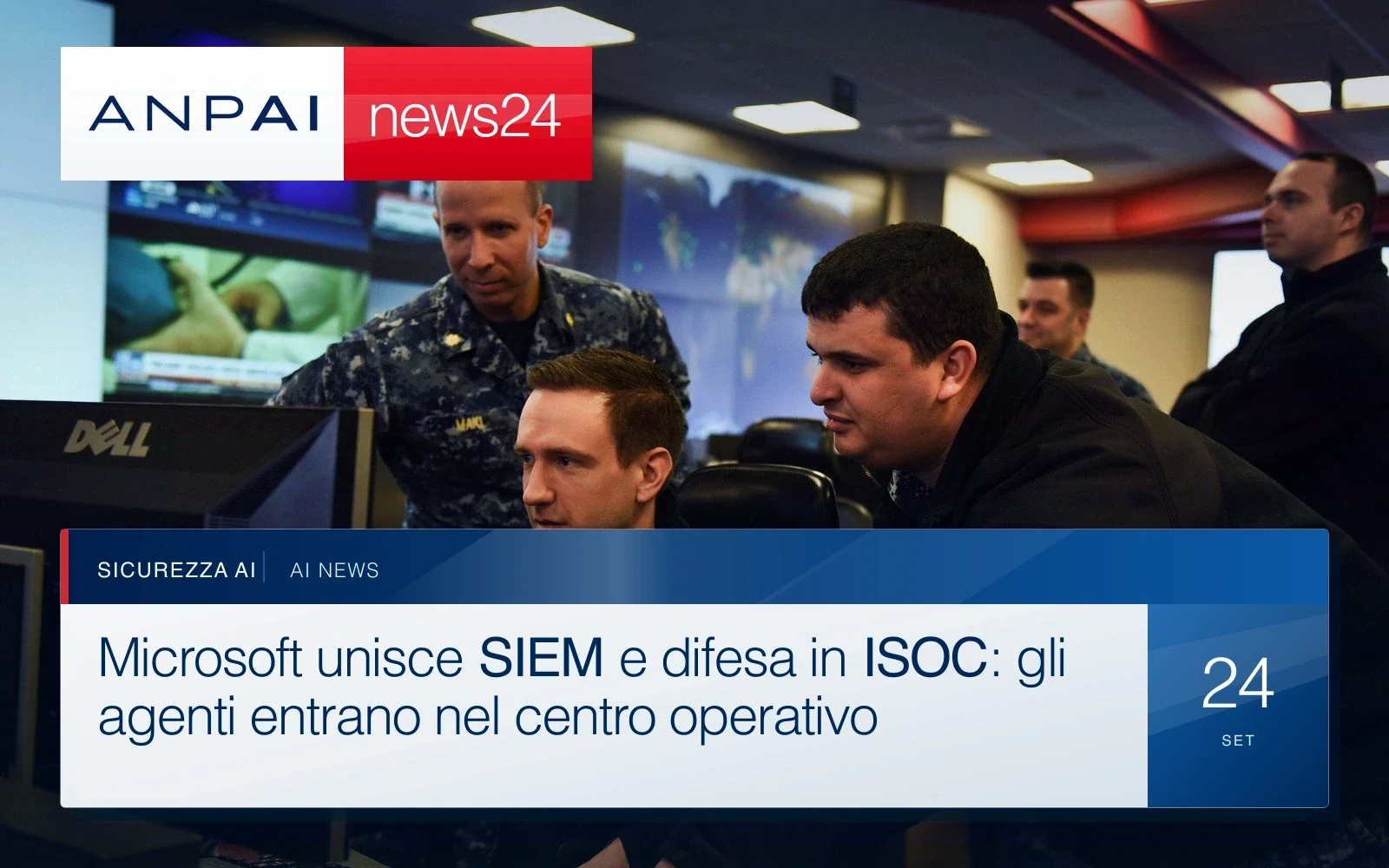 Operatori osservano le postazioni di un centro operativo con grandi schermi.